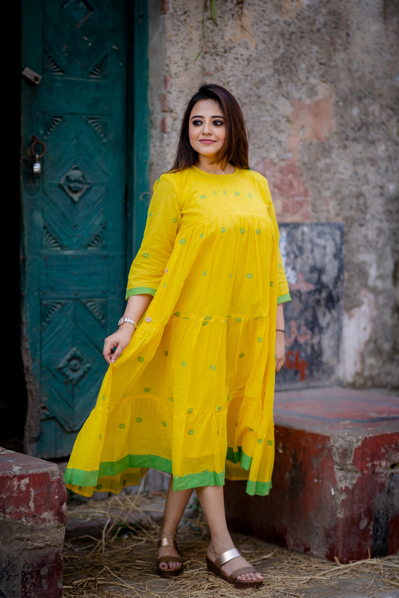 yellow jamdani tier dress with pleated yoke