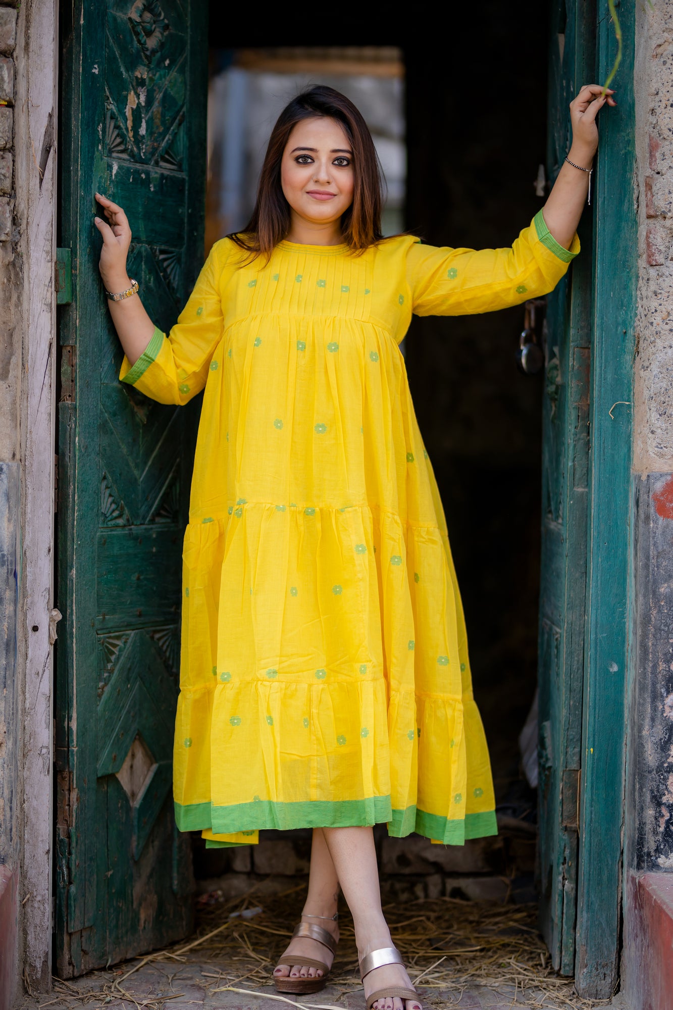 yellow jamdani tier dress with pleated yoke