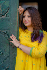 yellow jamdani tier dress with pleated yoke